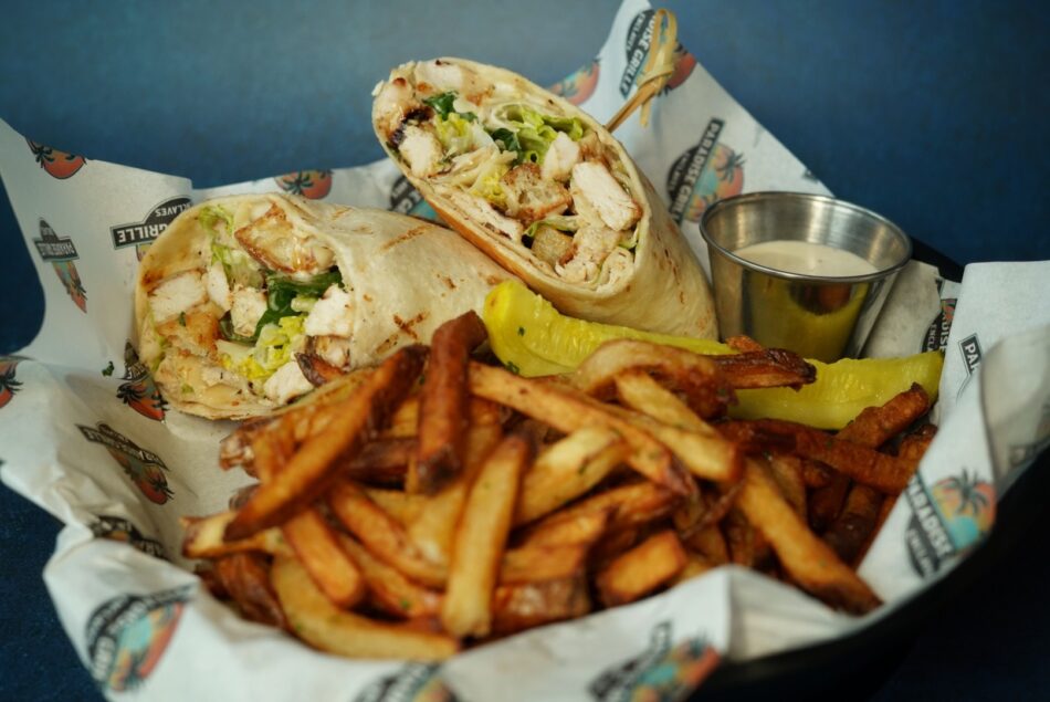Caesar wrap with hand-cut fries and pickles